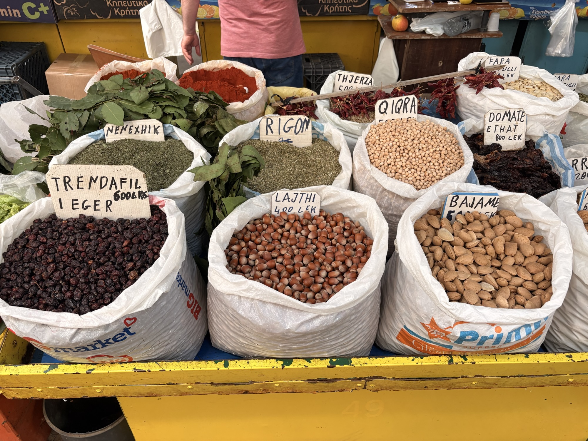 Herbs, beans, nuts, and spices at an Albanian market